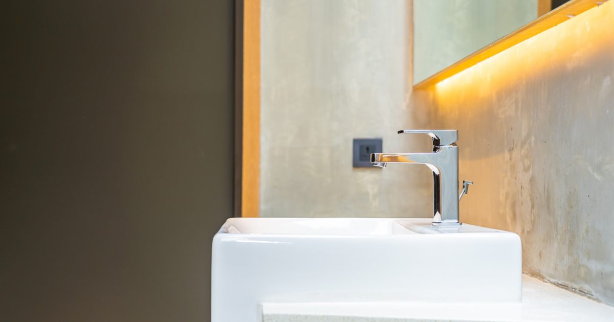 Bathroom tap mounted above a washbasin