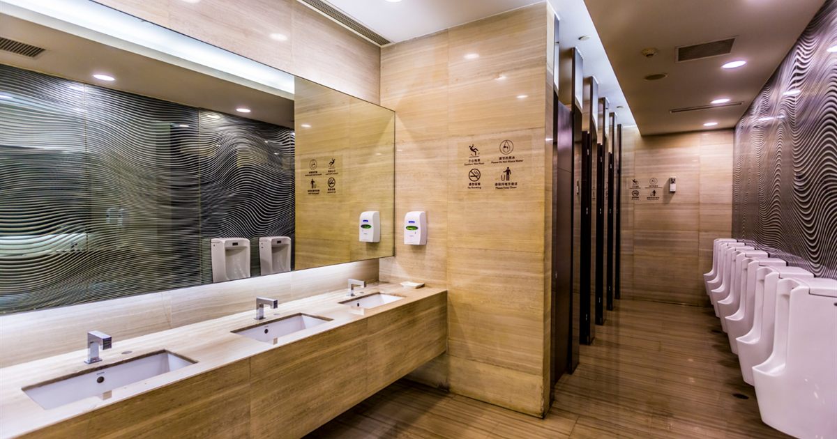 Commercial washroom with basins and urinals