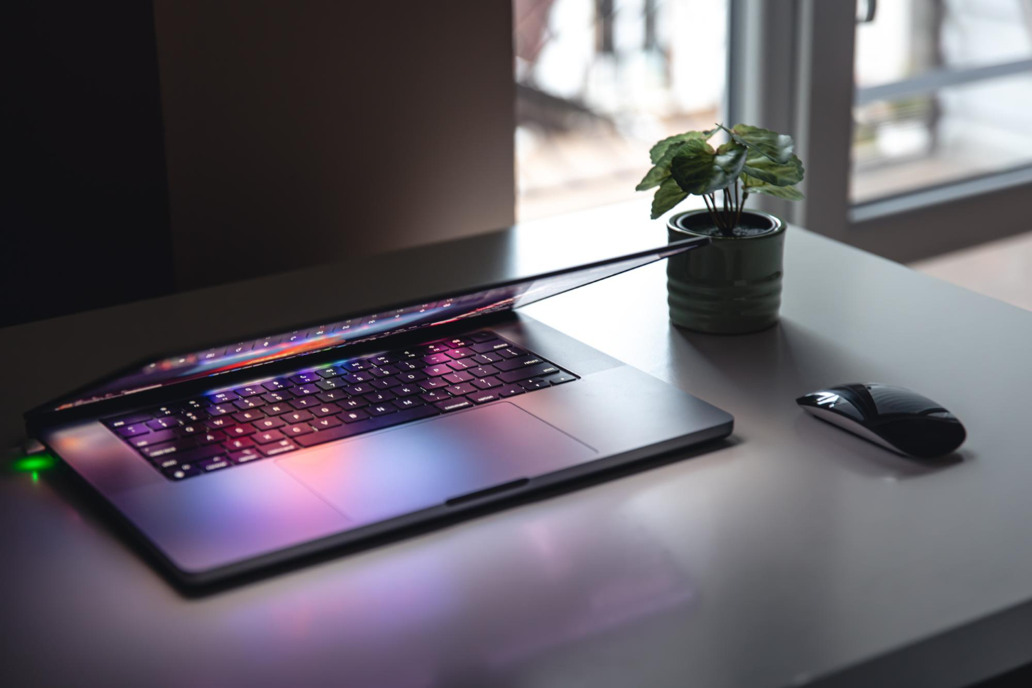 Close view of a laptop keyboard and display being checked before purchase