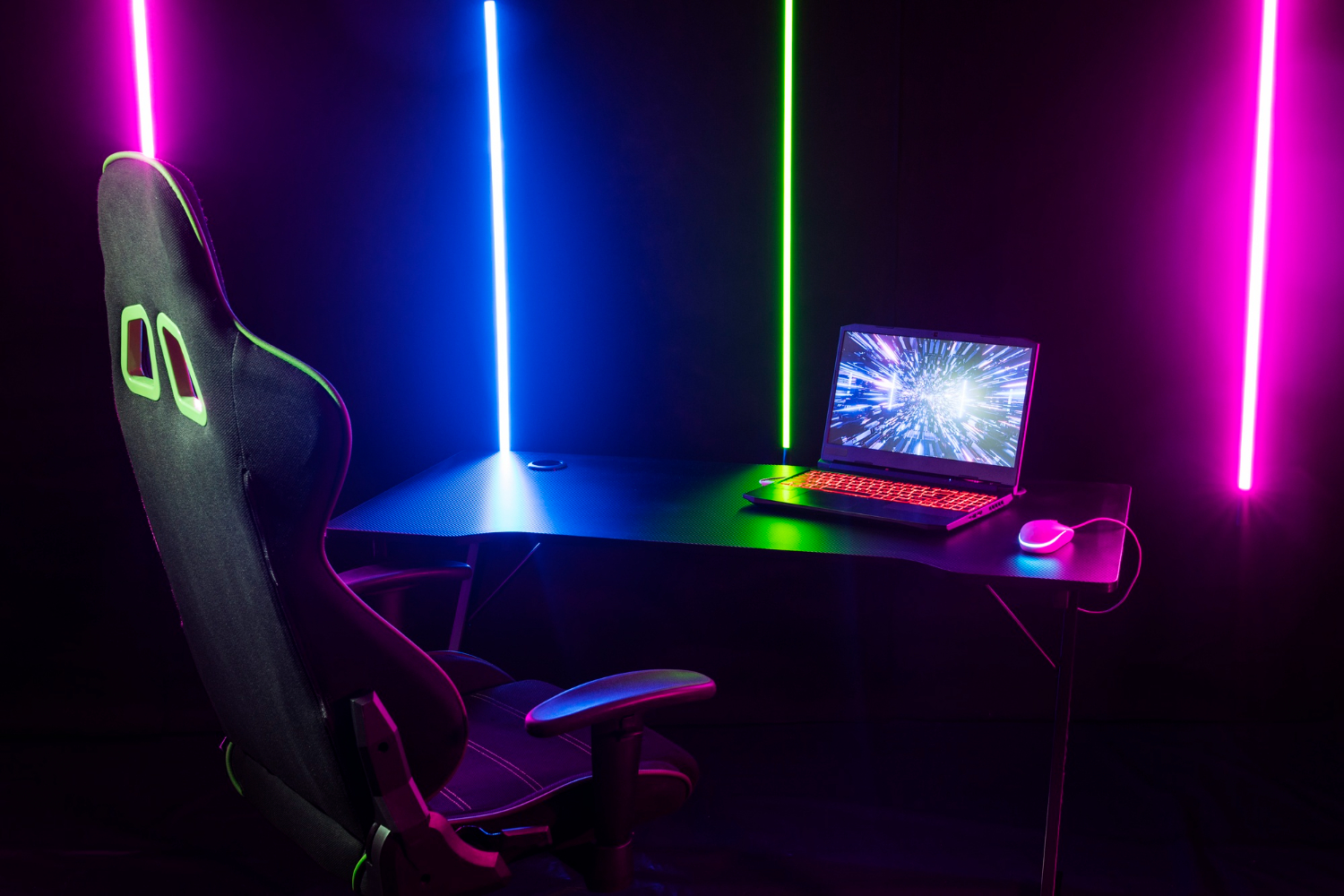 Gaming laptop in an RGB-lit setup for graphics performance comparison