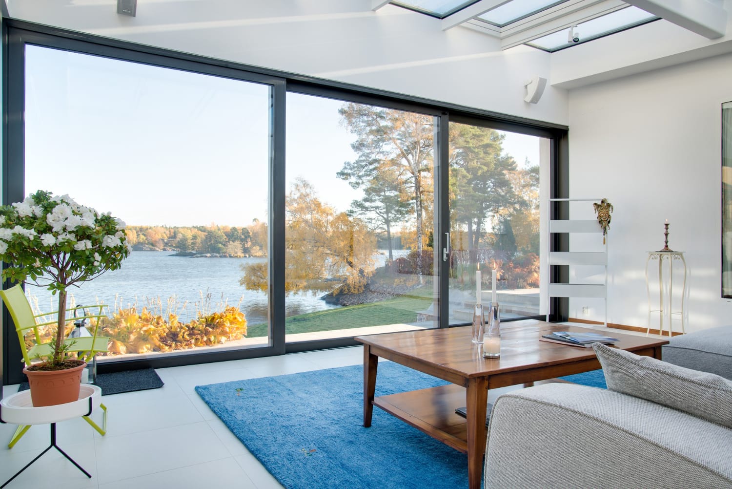 Wide glass patio doors beside living room seating